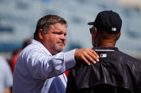 Mar 4, 2015; Tampa, FL, USA; ESPN baseball analyst John Kruk talks with New York Yankees guest instructor Reggie Jackson before a spring training baseball game against the Philadelphia Phillies at George M. Steinbrenner Field. Mandatory Credit: Kim Klement-USA TODAY Sports