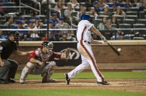 Sep 4, 2016; New York City, NY, USA; New York Mets right fielder Jay Bruce (19) hits a 2 run home run during the sixth inning of the game against the Washington Nationals at Citi Field. Mandatory Credit: Gregory J. Fisher-USA TODAY Sports