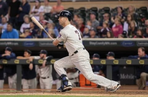 Sep 10, 2016; Minneapolis, MN, USA; Minnesota Twins first baseman Joe Mauer (7) hits a RBI single to end the game during the twelfth inning against the Cleveland Indians at Target Field. Minnesota Twins won 2-1. Mandatory Credit: Jordan Johnson-USA TODAY Sports