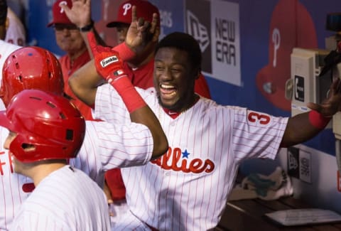 Jun 2, 2016; Philadelphia, PA, USA; Philadelphia Phillies center fielder Odubel Herrera (37) celebrates after a home run by third baseman Maikel Franco (7) during the fourth inning at Citizens Bank Park. Mandatory Credit: Bill Streicher-USA TODAY Sports