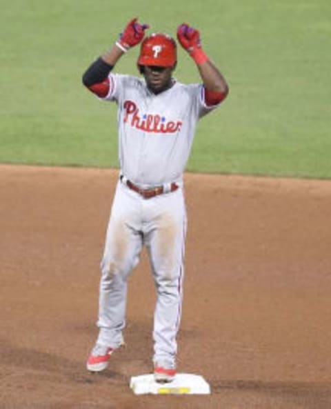 Jul 22, 2016; Pittsburgh, PA, USA; Philadelphia Phillies center fielder Odubel Herrera (37) reacts after hitting a double against the Pittsburgh Pirates during the seventh inning at PNC Park. Mandatory Credit: Charles LeClaire-USA TODAY Sports