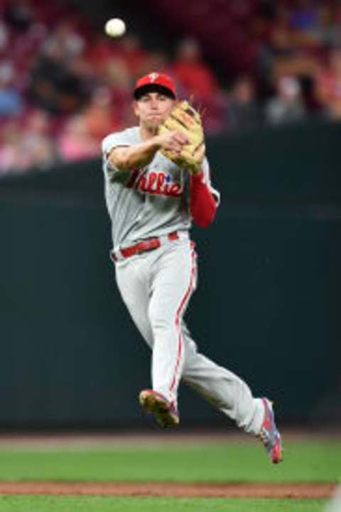 CINCINNATI, OH – JULY 27: Scott Kingery #4 of the Philadelphia Phillies throws to first base after fielding a ground ball in the sixth inning against the Cincinnati Reds at Great American Ball Park on July 27, 2018 in Cincinnati, Ohio. Cincinnati defeated Philadelphia 6-4. (Photo by Jamie Sabau/Getty Images)