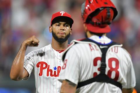 PHILADELPHIA, PA – AUGUST 03: Seranthony Dominguez #58 of the Philadelphia Phillies flexes towards teammate Jorge Alfaro #38 after beating the Miami Marlins 5-1 at Citizens Bank Park on August 3, 2018 in Philadelphia, Pennsylvania. (Photo by Drew Hallowell/Getty Images)