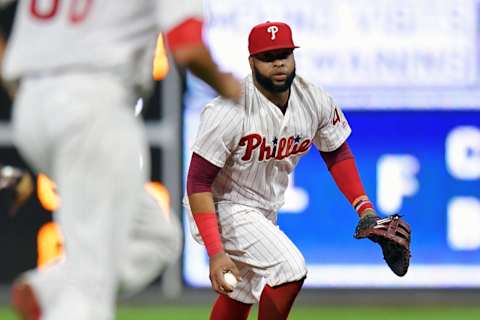 PHILADELPHIA, PA – AUGUST 04: Carlos Santana #41 of the Philadelphia Phillies goes to underhand the ball to Zach Eflin #56 for an out in the seventh inning against the Miami Marlins at Citizens Bank Park on August 4, 2018 in Philadelphia, Pennsylvania. (Photo by Drew Hallowell/Getty Images)