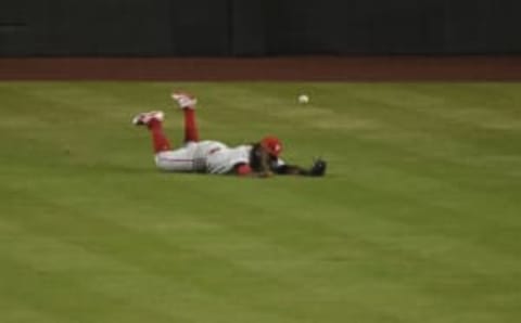 PHOENIX, AZ – AUGUST 08: Odubel Herrera #37 of the Philadelphia Phillies is unable to make the catch in the sixth inning of the MLB game against the Arizona Diamondbacks at Chase Field on August 8, 2018 in Phoenix, Arizona. (Photo by Jennifer Stewart/Getty Images)