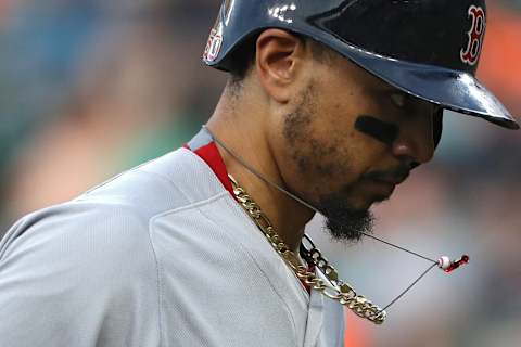 BALTIMORE, MD – AUGUST 10: Mookie Betts #50 of the Boston Red Sox looks on during the first inning against the Baltimore Orioles at Oriole Park at Camden Yards on August 10, 2018 in Baltimore, Maryland. (Photo by Patrick Smith/Getty Images)