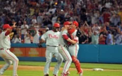 MIAMI – MAY 29: Roy Halladay of the Philadelphia Phillies is congratulated by his teammates after he pitched a perfect game against the Florida Marlins at Sun Life Stadium on Saturday, May 29, 2010, in Miami, Florida. Roy Halladay pitched a perfect game for the 20th perfect game in MLB history. (Photo by Robert Vigon/Florida Marlins/MLB Photos via Getty Images)