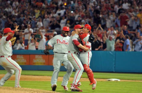 MIAMI – MAY 29: Roy Halladay of the Philadelphia Phillies is congratulated by his teammates after he pitched a perfect game against the Florida Marlins at Sun Life Stadium on Saturday, May 29, 2010, in Miami, Florida. Roy Halladay pitched a perfect game for the 20th perfect game in MLB history. (Photo by Robert Vigon/Florida Marlins/MLB Photos via Getty Images)