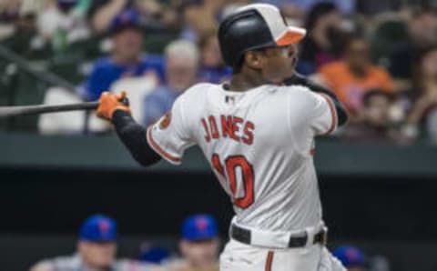 BALTIMORE, MD – AUGUST 14: Adam Jones #10 of the Baltimore Orioles hits a home run against the New York Mets during the sixth inning at Oriole Park at Camden Yards on August 14, 2018 in Baltimore, Maryland. (Photo by Scott Taetsch/Getty Images)