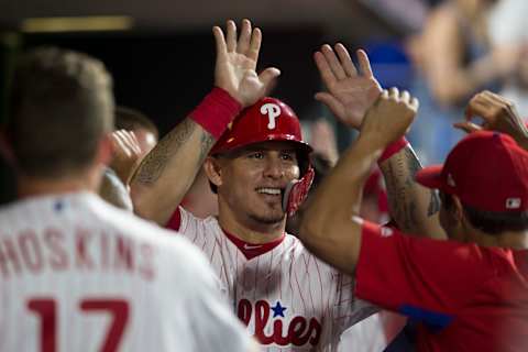 PHILADELPHIA, PA – AUGUST 15: Wilson Ramos #40 of the Philadelphia Phillies high fives his teammates in the dugout after scoring a run in the bottom of the sixth inning against the Boston Red Sox at Citizens Bank Park on August 15, 2018 in Philadelphia, Pennsylvania. The Phillies defeated the Red Sox 7-4. (Photo by Mitchell Leff/Getty Images)