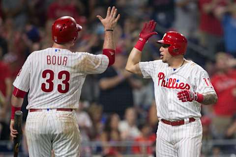 PHILADELPHIA, PA – AUGUST 15: Justin Bour #33 and Asdrubal Cabrera #13 of the Philadelphia Phillies celebrate after each scoring a run in the bottom of the seventh inning against the Boston Red Sox at Citizens Bank Park on August 15, 2018 in Philadelphia, Pennsylvania. The Phillies defeated the Red Sox 7-4. (Photo by Mitchell Leff/Getty Images)