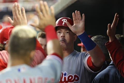 WASHINGTON, DC – AUGUST 22: Justin Bour #33 of the Philadelphia Phillies celebrates in the dugout after hitting a home run against the Washington Nationals during the third inning at Nationals Park on August 22, 2018 in Washington, DC. (Photo by Patrick Smith/Getty Images)