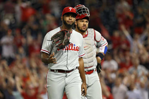 WASHINGTON, DC – AUGUST 22: Pitcher Seranthony Dominguez #58 of the Philadelphia Phillies tosses his glove in the air as he walks off of the field after giving up a walk-off home run to Ryan Zimmerman #11 of the Washington Nationals (not pictured) during the ninth inning at Nationals Park on August 22, 2018 in Washington, DC. (Photo by Patrick Smith/Getty Images)