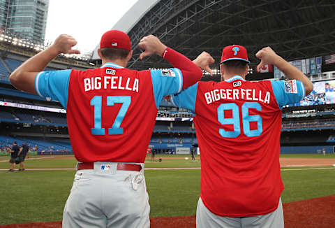 TORONTO, ON – AUGUST 24: Rhys Hoskins #17 of the Philadelphia Phillies and Tommy Hunter #96 pose for a photo while wearing nicknames on the backs of their jerseys on Players Weekend before the start of MLB game action against the Toronto Blue Jays at Rogers Centre on August 24, 2018 in Toronto, Canada. Players are wearing special jerseys with their nicknames on them during Players’ Weekend. (Photo by Tom Szczerbowski/Getty Images)