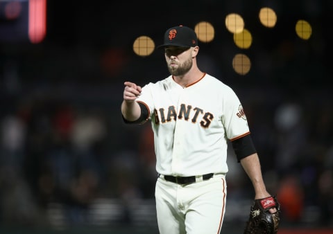 SAN FRANCISCO, CA – AUGUST 27: Hunter Strickland #60 of the San Francisco Giants points to catcher Nick Hundley #5 after they beat the Arizona Diamondbacks at AT&T Park on August 27, 2018 in San Francisco, California. (Photo by Ezra Shaw/Getty Images)