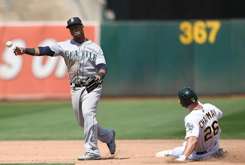 OAKLAND, CA – SEPTEMBER 02: Jean Segura #2 of the Seattle Mariners throws to first base to complete the double play against the Oakland Athletics in the bottom of the fourth inning at Oakland Alameda Coliseum on September 2, 2018 in Oakland, California. (Photo by Thearon W. Henderson/Getty Images)