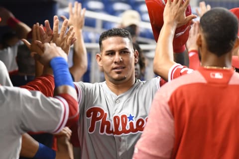 MIAMI, FL – SEPTEMBER 4: Wilson Ramos #40 of the Philadelphia Phillies is congratulated by teammates after scoring in the first inning against the Miami Marlins at Marlins Park on September 4, 2018 in Miami, Florida. (Photo by Eric Espada/Getty Images)