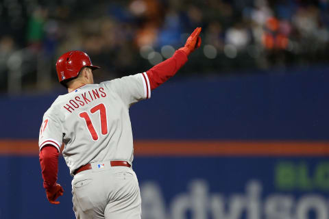 NEW YORK, NY – SEPTEMBER 08: Rhys Hoskins #17 of the Philadelphia Phillies gestures after he hits a home run against the New York Mets during the sixth inning of a game at Citi Field on September 8, 2018 in the Flushing neighborhood of the Queens borough of New York City. The Mets defeated the Phillies 10-5. (Photo by Rich Schultz/Getty Images)