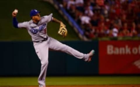 ST. LOUIS, MO – SEPTEMBER 13: Manny Machado #8 of the Los Angeles Dodgers throws to first base against the St. Louis Cardinals in the sixth inning at Busch Stadium on September 13, 2018 in St. Louis, Missouri. (Photo by Dilip Vishwanat/Getty Images)