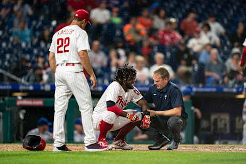 PHILADELPHIA, PA – SEPTEMBER 17: Philadelphia Phillies Manager Gabe Kapler (22) looks on as the trainer attends to Philadelphia Phillies Outfield Odubel Herrera (37) who was hit by a pitch during the fifth inning of a Major League Baseball game between the New York Mets and the Philadelphia Phillies on September 17, 2018( (Photo by Gregory Fisher/Icon Sportswire via Getty Images)