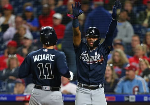 PHILADELPHIA, PA – SEPTEMBER 28: Ronald Acuna Jr. #13 of the Atlanta Braves reacts as Ender Inciarte #11 scores on a two-run double by Freddie Freeman #5 against the Philadelphia Phillies during the eighth inning of a game at Citizens Bank Park on September 28, 2018 in Philadelphia, Pennsylvania. (Photo by Rich Schultz/Getty Images)