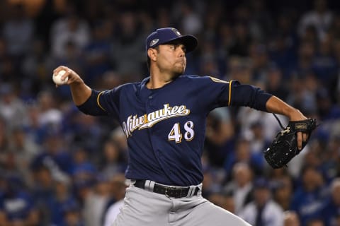 LOS ANGELES, CA – OCTOBER 16: Joakim Soria #48 of the Milwaukee Brewers delivers a pitch in the seventh inning against the Los Angeles Dodgers in Game Four of the National League Championship Series at Dodger Stadium on October 16, 2018 in Los Angeles, California. (Photo by Harry How/Getty Images)