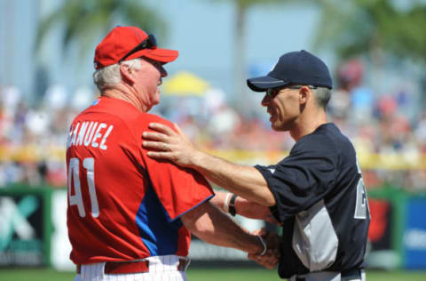 CLEARWATER, FL – FEBRUARY 27: Manager Joe Girardi #28 of the New York Yankees talks with manager Charlie Manuel #41 of the Philadelphia Phillies before play February 27, 2011 at Bright House Field in Clearwater, Florida. (Photo by Al Messerschmidt/Getty Images)