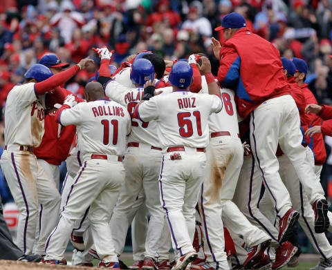 PHILADELPHIA, PA – APRIL 01: Members of the Philadelphia Phillies celebrate after defeating the Houston Astros 5-4 during opening day at Citizens Bank Park on April 1, 2011 in Philadelphia, Pennsylvania. (Photo by Rob Carr/Getty Images)