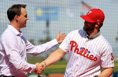 Bryce Harper is introduced to the Philadelphia Phillies by General Manager Matt Klentak (Photo by Mike Ehrmann/Getty Images)