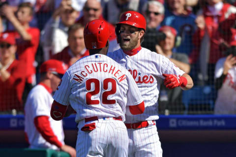 PHILADELPHIA, PA – MARCH 28: Bryce Harper #3 of the Philadelphia Phillies congratulates teammate Andrew McCutchen #22 after a home run in the first inning against the Atlanta Braves on Opening Day at Citizens Bank Park on March 28, 2019 in Philadelphia, Pennsylvania. (Photo by Drew Hallowell/Getty Images)