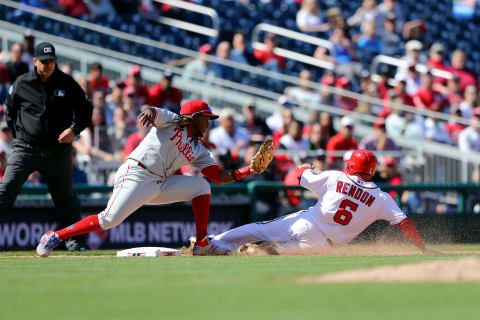 WASHINGTON, DC – APRIL 03: Anthony Rendon #6 of the Washington Nationals slides into third base as Maikel Franco #7 of the Philadelphia Phillies tries to make the tag during the game between the Philadelphia Phillies and the Washington Nationals at Nationals Park on Wednesday, April 3, 2019 in Washington, District of Columbia. (Photo by Alex Trautwig/MLB Photos via Getty Images)