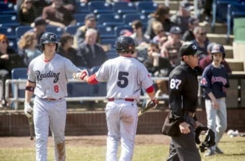 PORTLAND, ME – APRIL 6: Reading Fightin Phils players Henri Lartigue (8) and Josh Stephen (5) celebrate after a run at Hadlock Field on Saturday, April 6, 2019. Reading won 8-1. (Staff photo by Brianna Soukup/Portland Portland Press Herald via Getty Images)