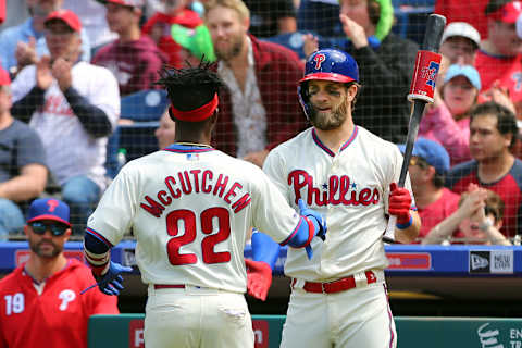 PHILADELPHIA, PA – APRIL 28: Andrew McCutchen #22 of the Philadelphia Phillies is congratulated by Bryce Harper #3 after he scored on a triple by Jean Segura #2 against the Miami Marlins during the third inning of a game at Citizens Bank Park on April 28, 2019 in Philadelphia, Pennsylvania. (Photo by Rich Schultz/Getty Images)