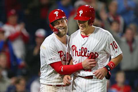 PHILADELPHIA, PA – APRIL 16: Bryce Harper #3 and J.T. Realmuto #10 of the Philadelphia Phillies celebrate after scoring on a double by Scott Kingery #4 against the New York Mets during the sixth inning of a game at Citizens Bank Park on April 16, 2019 in Philadelphia, Pennsylvania. (Photo by Rich Schultz/Getty Images)