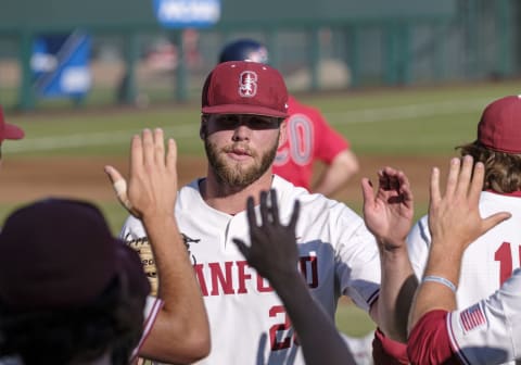 STANFORD, CA – JUNE 02: Stanford Cardinal pitcher Erik Miller (26) gets team congratulations for finishing up the top of the 1st inning in the Regional Champions game between Stanford and Fresno State on Sunday, June 02, 2019 at Klein Field in Stanford, California. (Photo by Douglas Stringer/Icon Sportswire via Getty Images)