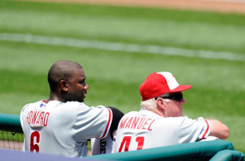 Manager Charlie Manuel #41 and Ryan Howard #6 of the Philadelphia Phillies (Photo by Greg Fiume/Getty Images)