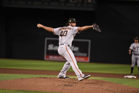 PHOENIX, ARIZONA – MAY 18: Madison Bumgarner #40 of the San Francisco Giants delivers a first inning warm up pitch against the Arizona Diamondbacks at Chase Field on May 18, 2019 in Phoenix, Arizona. (Photo by Norm Hall/Getty Images)