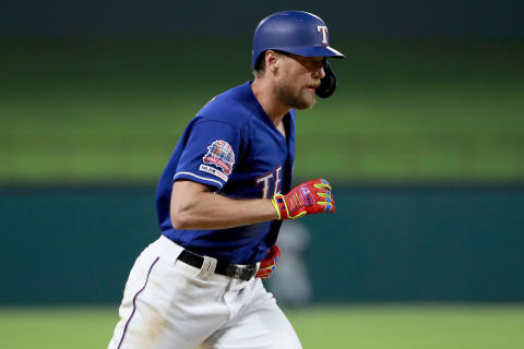 ARLINGTON, TEXAS – MAY 20: Hunter Pence #24 of the Texas Rangers rounds the bases after hitting a two-run home run against the Seattle Mariners in the bottom of the seventh inning at Globe Life Park in Arlington on May 20, 2019 in Arlington, Texas. (Photo by Tom Pennington/Getty Images)