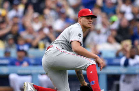 LOS ANGELES, CALIFORNIA – JUNE 02: Yacksel Rios #53 of the Philadelphia Phillies reacts to his throwing error on a bunt single from Chris Taylor #3 of the Los Angeles Dodgers, allowing two runs to score, to trail 6-0 during the eighth inning at Dodger Stadium on June 02, 2019 in Los Angeles, California. (Photo by Harry How/Getty Images)