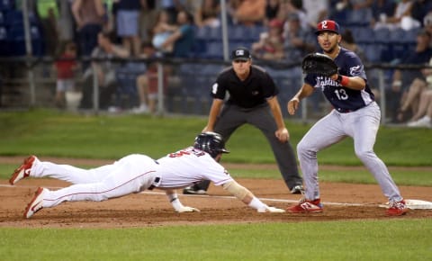 PORTLAND, ME – AUGUST 19: Sea Dogs’ Brett Netzer beats a pickoff attempt by Reading’s first baseman Darick Hall and pitcher Julian Hall. (Staff photo by Ben McCanna/Portland Portland Press Herald via Getty Images)