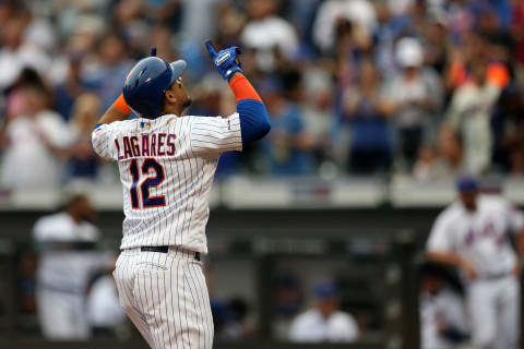 FLUSHING, NY – SEPTEMBER 12: Juan Lagares #12 of the New York Mets hits a home run against the Arizona Diamondbacks at Citi Field on Thursday, September 12, 2019 in Flushing, New York. (Photo by Rob Tringali/MLB Photos via Getty Images)