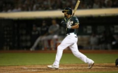 OAKLAND, CA – AUGUST 20: Marcus Semien #10 of the Oakland Athletics hits a double during the game against the New York Yankees at the Oakland-Alameda County Coliseum on August 20, 2019 in Oakland, California. The Athletics defeated the Yankees 6-2. (Photo by Michael Zagaris/Oakland Athletics/Getty Images)