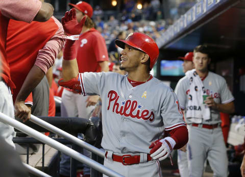 NEW YORK, NEW YORK – SEPTEMBER 07: Cesar Hernandez #16 of the Philadelphia Phillies celebrates his first inning home run against the New York Mets with his teammates in the dugout at Citi Field on September 07, 2019 in New York City. (Photo by Jim McIsaac/Getty Images)