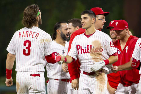 PHILADELPHIA, PA – SEPTEMBER 27: Adam Haseley #40 of the Philadelphia Phillies shakes hands with Bryce Harper #3 after hitting a game winning fielders choice in the bottom of the fifteenth inning against the Miami Marlins at Citizens Bank Park on September 27, 2019 in Philadelphia, Pennsylvania. The Phillies defeated the Marlins 5-4 in fifteenth inning. (Photo by Mitchell Leff/Getty Images)