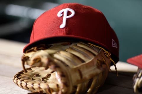 A Philadelphia Phillies hat in the dugout (Photo by G Fiume/Getty Images)