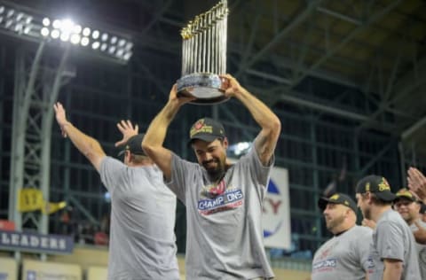 HOUSTON, TEXAS – OCTOBER 30: The Washington Nationals, including Washington Nationals third baseman Anthony Rendon (6) holding trophy, celebrate beating the Houston Astros 6-2 in Game 7 of the World Series at Minute Maid Park on Wednesday, October 30, 2019. (Photo by John McDonnell/The Washington Post via Getty Images)