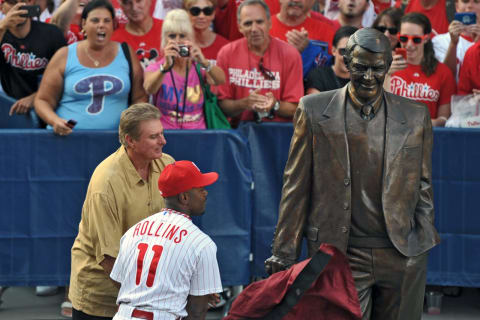 PHILADELPHIA, PA – AUGUST 16: A statue of former Philadelphia Phillies announcer Harry Kalas is unveiled by former pitcher Steve Carlton and Jimmy Rollins #11 of the Philadelphia Phillies before the game against the Arizona Diamondbacks at Citizens Bank Park on August 16, 2011 in Philadelphia, Pennsylvania. The Diamondbacks won 3-2. (Photo by Drew Hallowell/Getty Images)