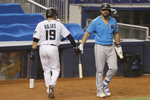 MIAMI, FLORIDA – JULY 10: Miguel Rojas #19 and Jorge Alfaro #38 of the Miami Marlins high five during a simulated game at Marlins Park on July 10, 2020 in Miami, Florida. Phillies (Photo by Michael Reaves/Getty Images)