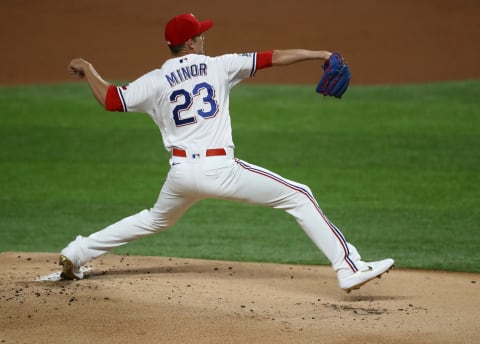 ARLINGTON, TEXAS – AUGUST 11: Mike Minor #23 of the Texas Rangers throws against the Seattle Mariners in the first inning at Globe Life Field on August 11, 2020 in Arlington, Texas. (Photo by Ronald Martinez/Getty Images)