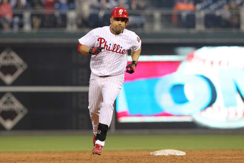 PHILADELPHIA – JUNE 4: Third baseman Placido Polanco #27 of the Philadelphia Phillies circles the bases after hitting a home run during a game against the Los Angeles Dodgers at Citizens Bank Park on June 4, 2012 in Philadelphia, Pennsylvania. (Photo by Hunter Martin/Getty Images)